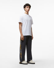 Load image into Gallery viewer, Reflective Print Logo Track Pants : Men Trousers Black | GCDS Spring/Summer 2023
